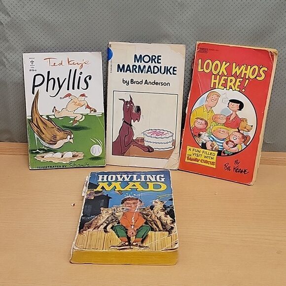 4 paperback cartoon books  - Picture 1 of 12